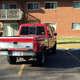 Realigning a parking job requires multiple people and, on a truck this old, several tetanus boosters